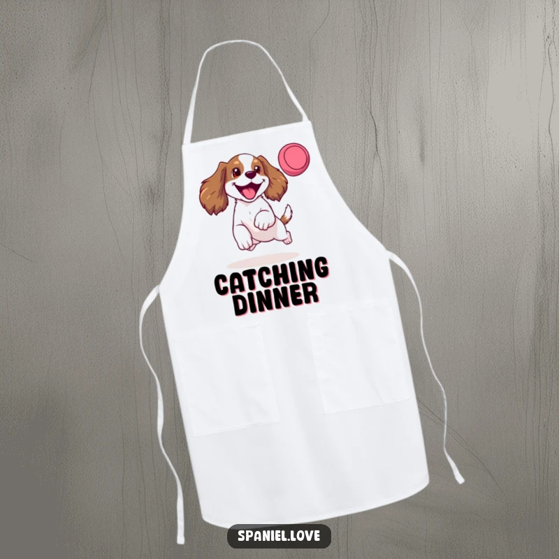 Funny apron with a happy spaniel mid-leap for a frisbee, tongue out, bringing energetic and amusing vibes to the kitchen.
