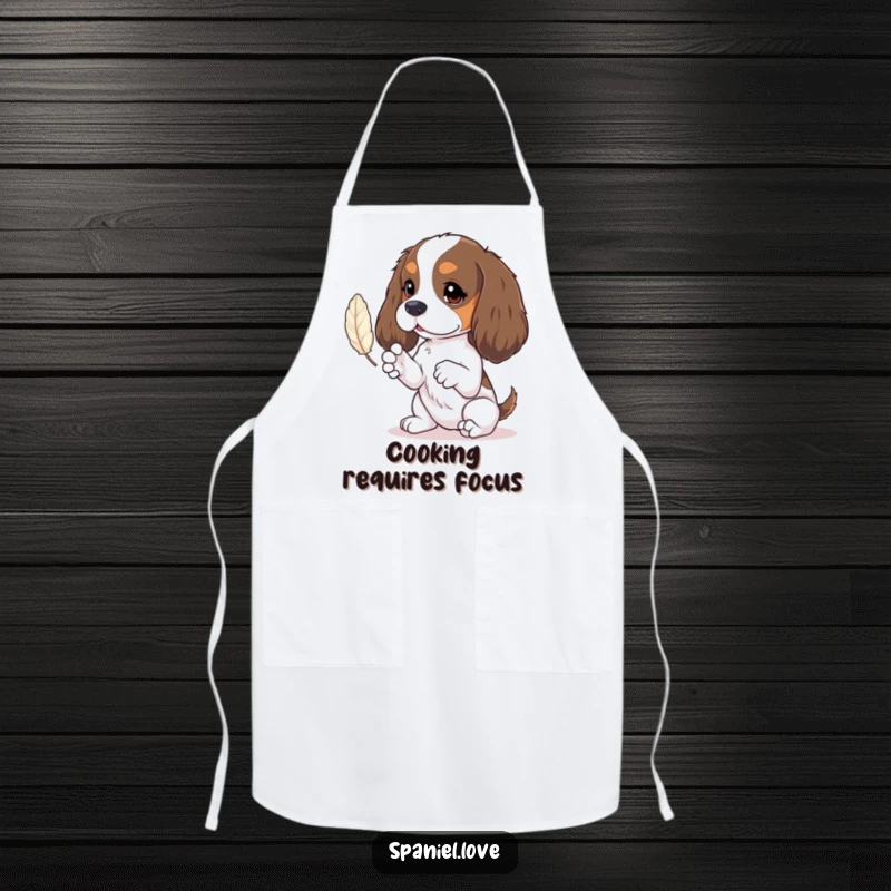 Funny spaniel apron depicting tiny paws batting at a feather, bringing charm and playfulness to the kitchen.