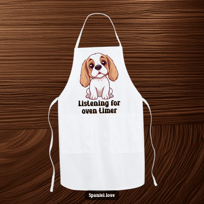 Funny spaniel apron featuring a dog with perked ears listening intently, a humorous addition to any kitchen, perfect for gift.