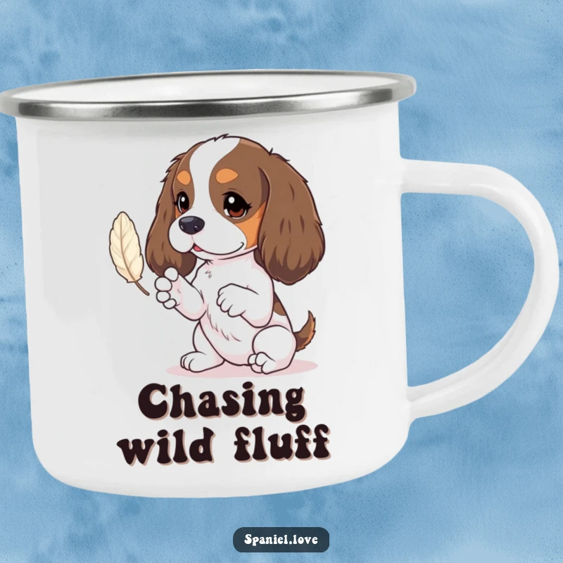 Funny spaniel camping mug featuring tiny paws batting at a feather, ideal for charming outdoor enjoyment.