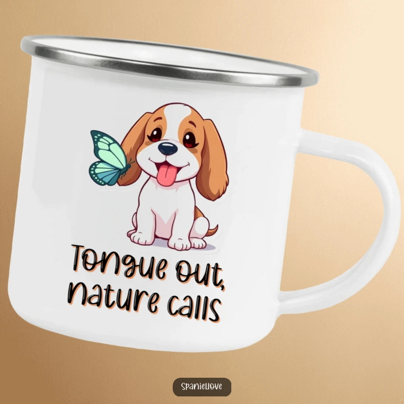 Funny Spaniel Camping Mug: A spaniel playfully sticks its tongue out chasing a butterfly, bringing whimsical humor to your adventures.