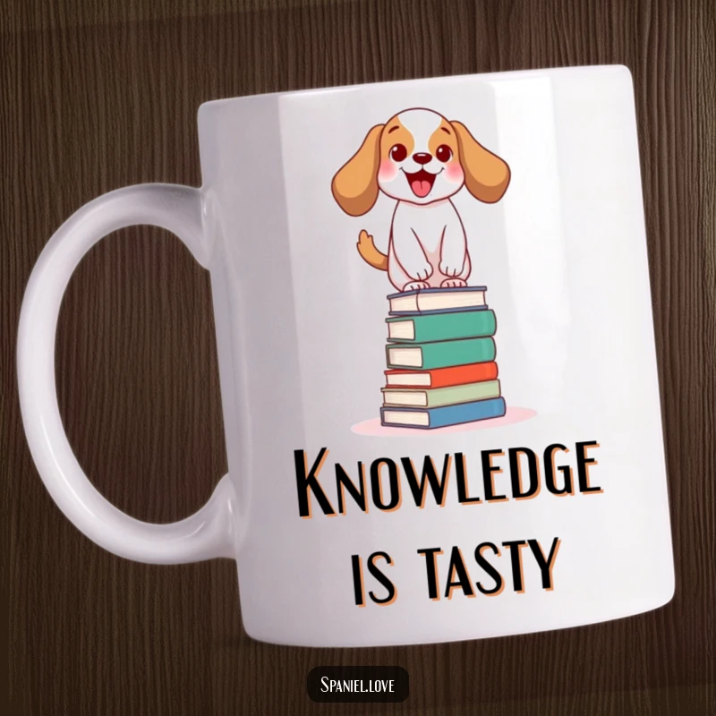 Funny bookworm spaniel mug showing an excited dog wagging its tail while balancing precariously on a tall stack of books.