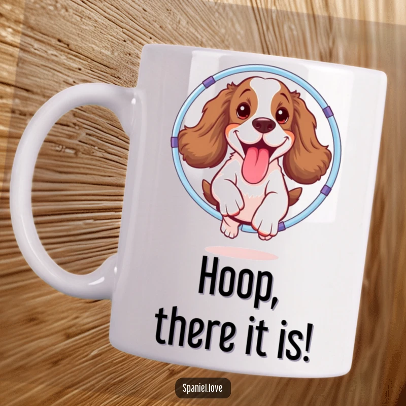Funny spaniel mug showing a happy dog with its tongue out joyfully leaping through a colorful hula hoop, full of boundless energy.