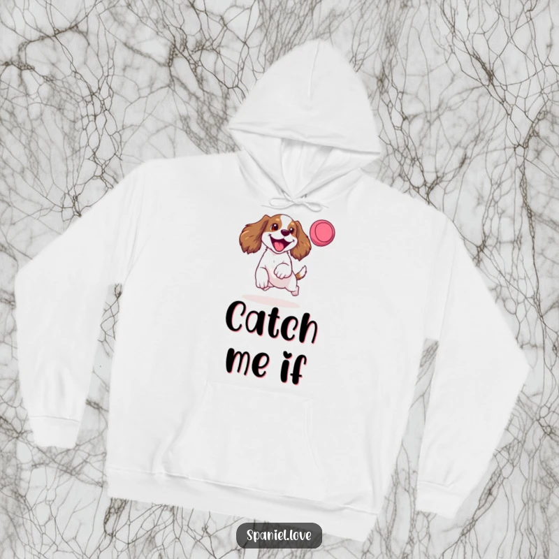 Funny hoodie showing a happy spaniel mid-leap, mouth open in a bark, tongue lolling as it goes for a frisbee.