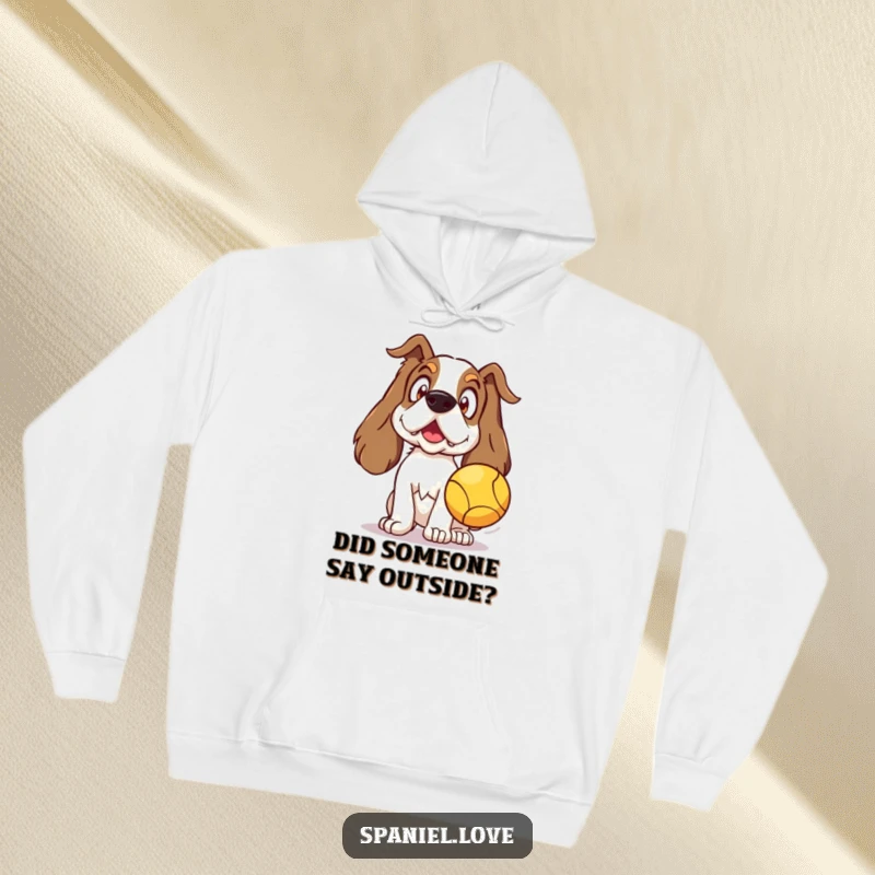 Funny Spaniel Hoodie depicting a surprised spaniel eagerly awaiting a thrown ball, a cozy and humorous apparel choice.