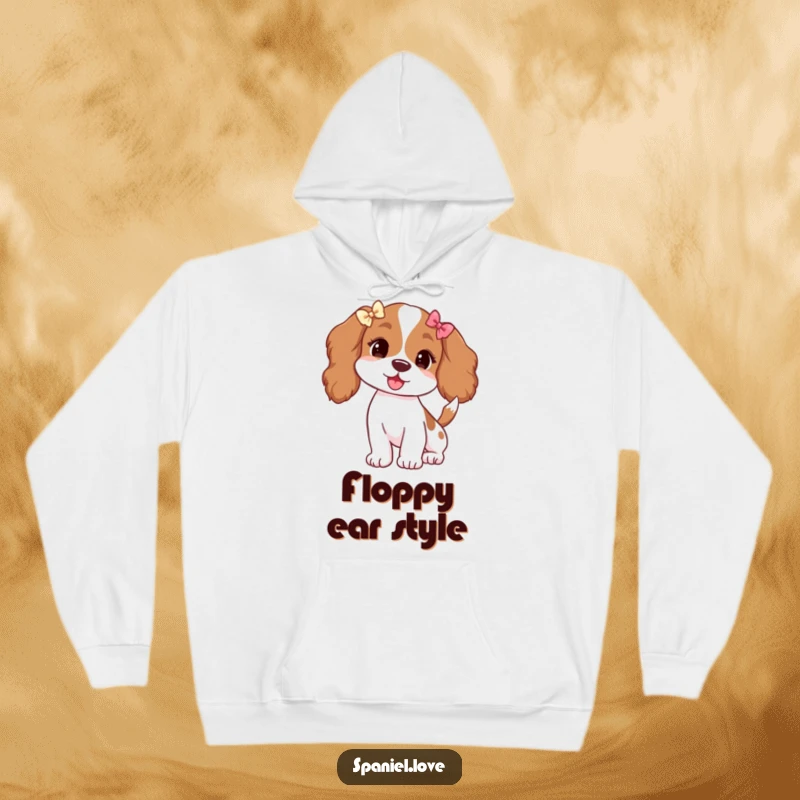 Funny hoodie featuring a spaniel adorned with tiny bows on its ears, its tail wagging vigorously in happiness.