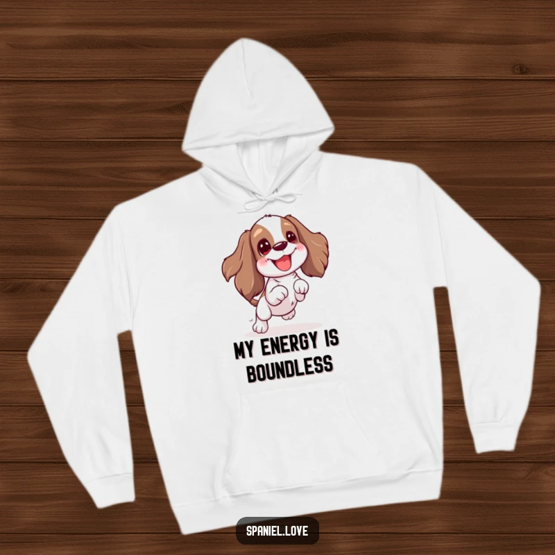 Funny Spaniel hoodie featuring a character's excited wiggle and jump for a toy. This design combines comfort with a spirit of energetic play.