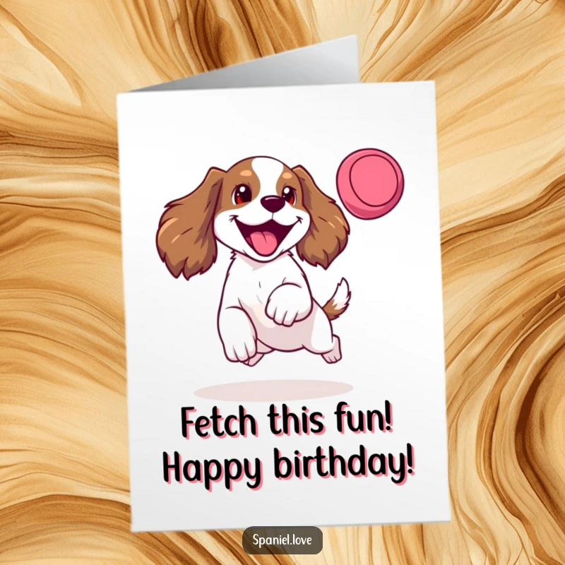 Funny Free Printable Birthday Card: Happy spaniel barking, tongue out, mid-leap catching a frisbee, full of birthday energy.