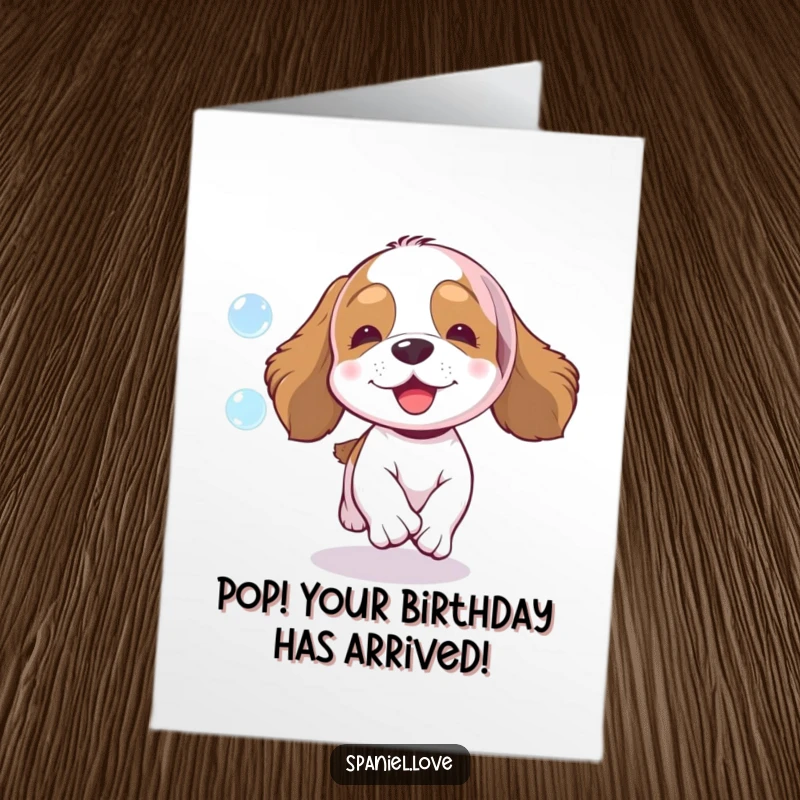 Funny Free Printable Birthday Card: Enthusiastic spaniel joyfully chasing a floating, sparkling bubble, ready for a birthday surprise.