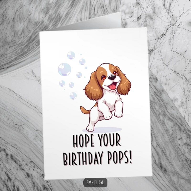 Funny Free Printable Birthday Card: Happy spaniel joyfully chases and plays with a stream of iridescent bubbles.