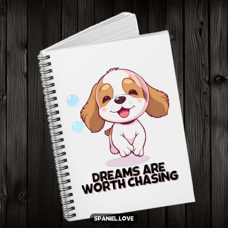 Funny spaniel notebook, a happy dog enthusiastically chasing a shimmering bubble, ideal for capturing thoughts with fun.