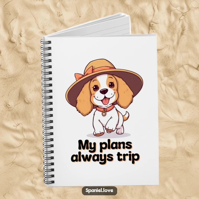 Funny spaniel notebook, a playful dog tripping with a comically large hat, perfect for journaling with personality and humor.