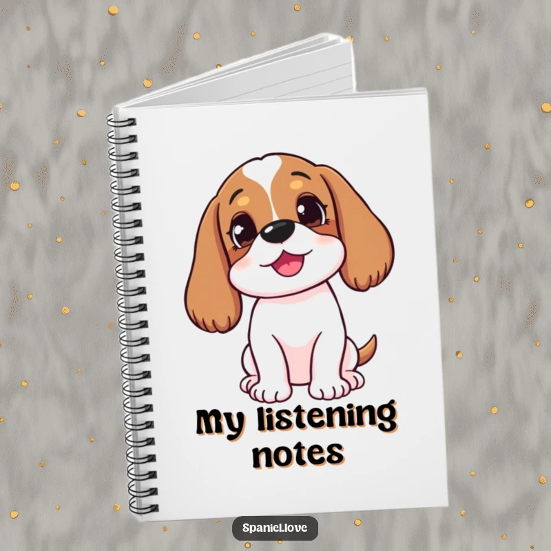 Funny happy spaniel with head tilted, listening intently on a notebook cover, ideal for jotting down curious thoughts.