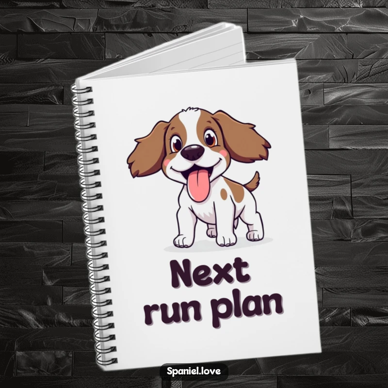 Funny Spaniel Notebook showing a happy spaniel panting with its tongue out, perfect for jotting notes.