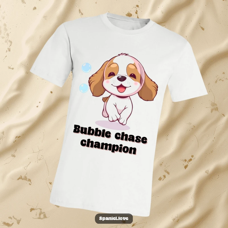 Funny spaniel t-shirt, an excited spaniel dog enthusiastically pursuing a shimmering, iridescent bubble, capturing playful energy.