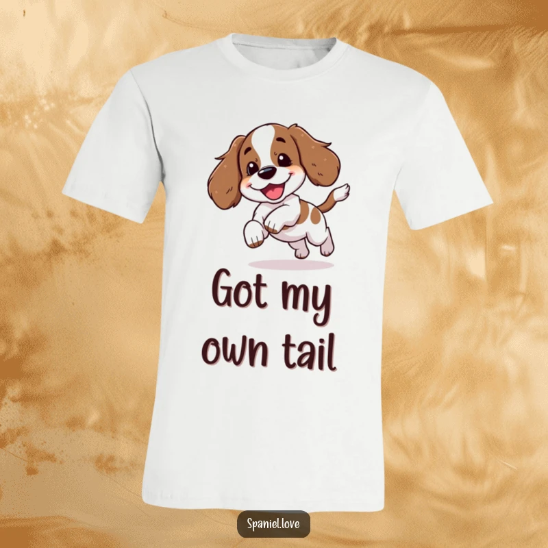 Funny illustration of a spaniel character mid-tail chase, letting out a happy yip, printed on a comfortable t-shirt.