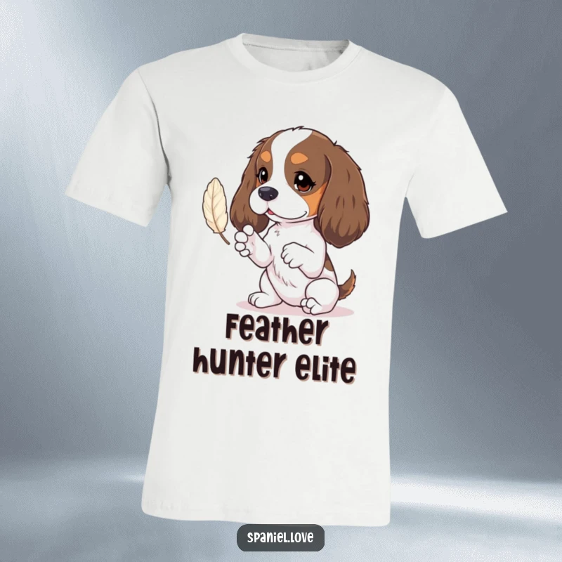 Funny spaniel t-shirt showing tiny paws batting at a floating feather, a whimsical and cute design.