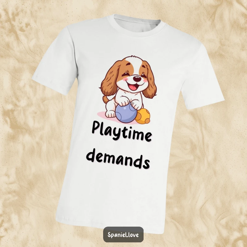 Funny kawaii spaniel with a cheerful bark, playfully nudging a ball on a T-shirt, showcasing playful canine energy.