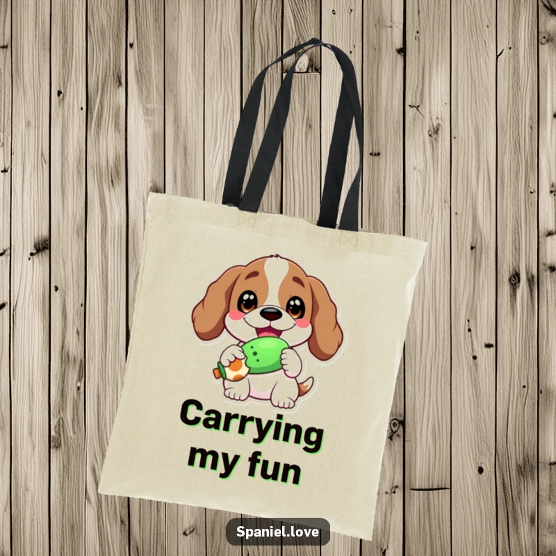 Funny tote bag with a spaniel character sporting a wide, happy grin, holding a squeaky toy.