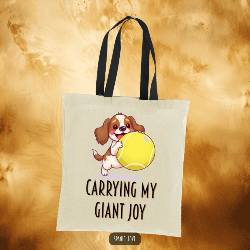 Funny spaniel tote bag, a joyful dog happily playing with an oversized tennis ball, functional and amusing.