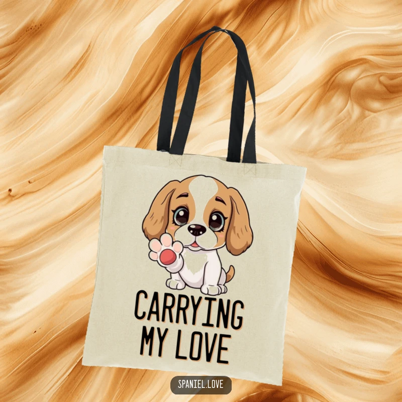Funny Spaniel tote bag with wide, adoring eyes and an offered paw. This bag is perfect for carrying essentials while radiating love and companionship.