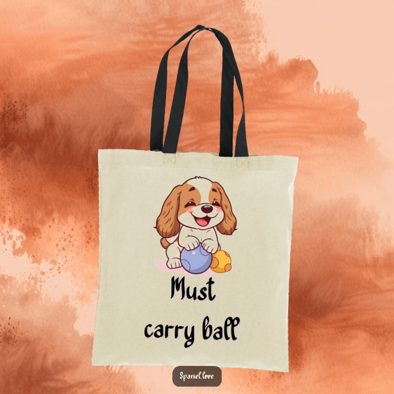 Funny kawaii spaniel with a cheerful bark, nudging a ball on a tote bag, ideal for carrying essentials humorously.