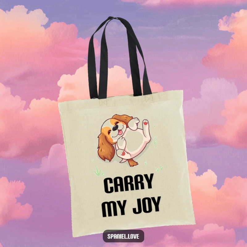 Funny spaniel rolling on its back in grass on a tote bag, ideal for carrying items with a humorous, joyful vibe.